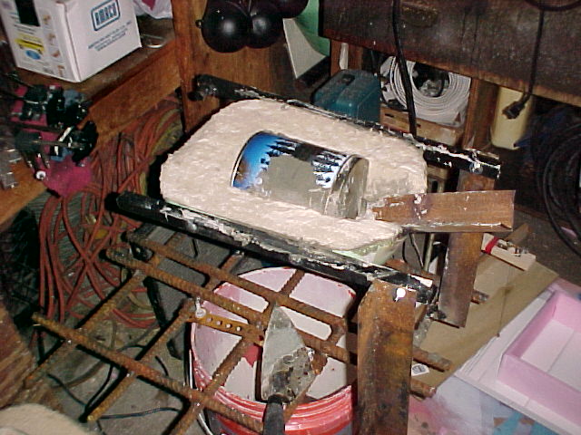 refractory poured into reverb bottom with can spacer in place.jpg